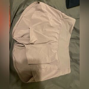 Lululemon purple mid rise 4 inch speed up shorts